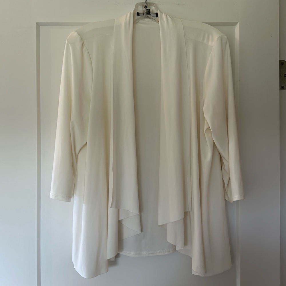 Like new light weight sweater jacket dressy size L preowned nonsmoking home